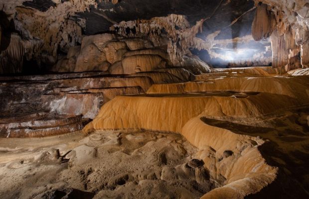 Stalagmites inside Tu Lan Cave